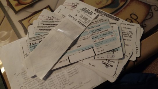 a thick stack of boarding passes